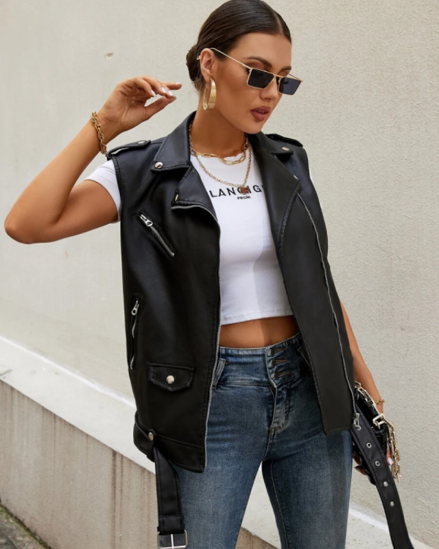 Stylish women’s black leather biker vest paired with jeans and crop top – Biker Vest US